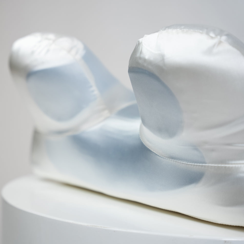 Silk pillowcase and cooling pads on memory foam pillow for hot flushes